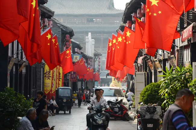 China’s economy grew 5.3% in the first quarter, beating expectations